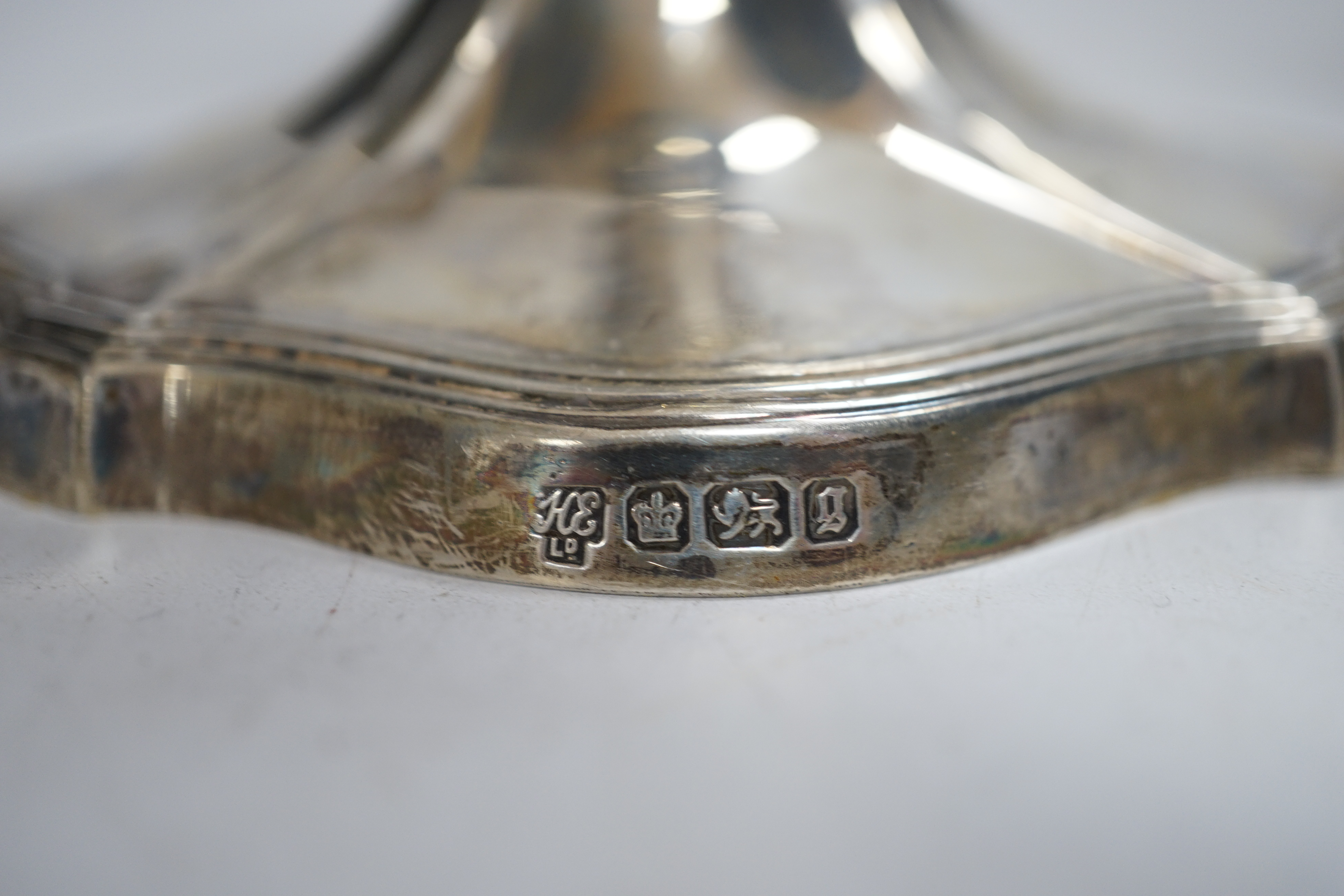A pair of late Victorian silver mounted dwarf candlesticks, Hawksworth, Eyre & Co, Sheffield, 1899, 93mm.